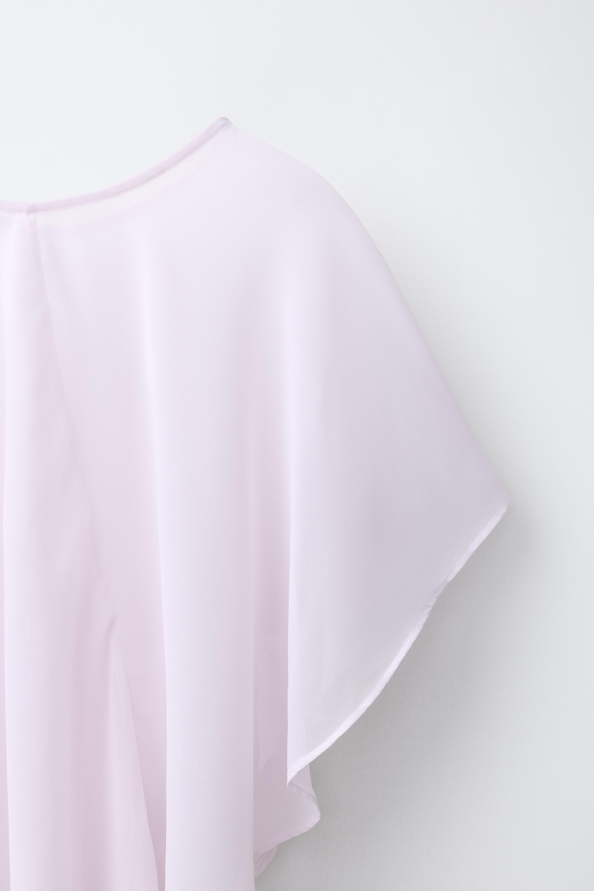 ASYMMETRIC CHIFFON CAPE